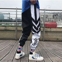 Load image into Gallery viewer, pantalon noir et blanc avec motifs