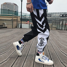 Load image into Gallery viewer, pantalon noir et blanc avec motifs
