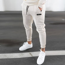 Load image into Gallery viewer, pantalon pour homme crème avec motifs noir
